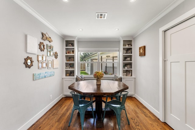 1011 Martin St, Houston, TX 77018 - dining room featuring crown molding, wood finished floors, and recessed lighting
