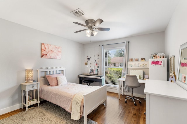 1011 Martin St, Houston, TX 77018 - bedroom featuring an office area, wood finished floors, and a ceiling fan