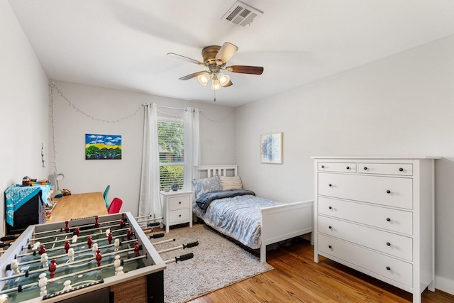1011 Martin St, Houston, TX 77018 - bedroom with wood finished floors and ceiling fan