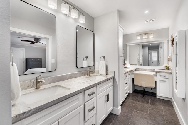 1011 Martin St, Houston, TX 77018 - bathroom featuring double vanity and ceiling fan