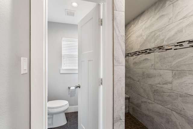 1011 Martin St, Houston, TX 77018 - bathroom with a walk in shower and tile patterned floors