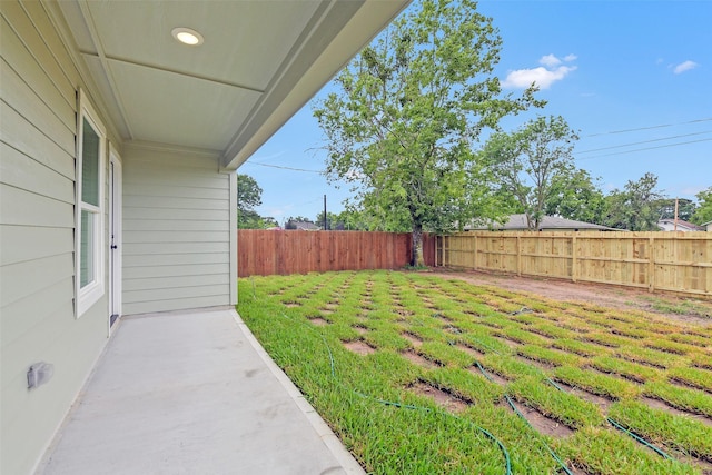 405 3rd St, Hempstead, TX 77445 - fenced backyard featuring a patio area