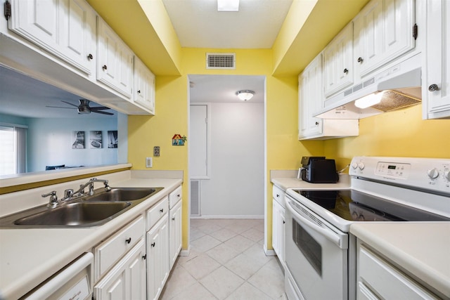 4001 E Nasa Rd Unit 118, Seabrook, TX 77586 - kitchen featuring white appliances, under cabinet range hood, white cabinets, and light countertops