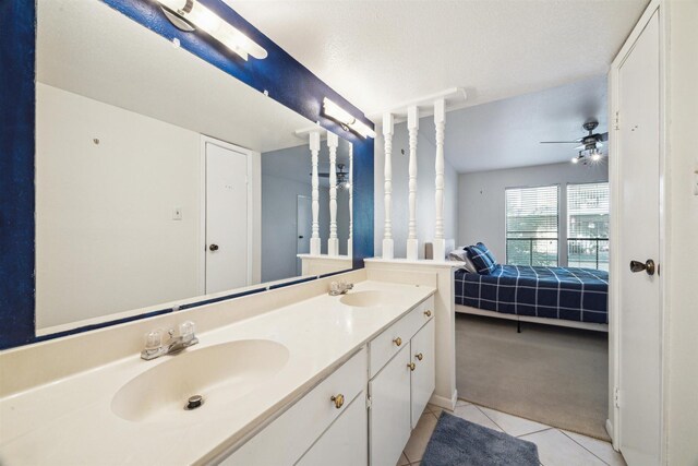 4001 E Nasa Rd Unit 118, Seabrook, TX 77586 - ensuite bathroom with tile patterned floors, double vanity, and a ceiling fan