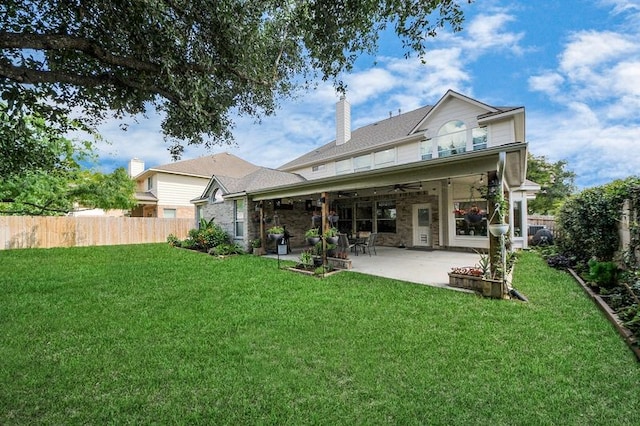 30103 Canyon Branch Ct, Spring, TX 77386 - rear view of house featuring ceiling fan, a patio, and a chimney