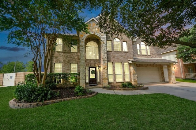 30103 Canyon Branch Ct, Spring, TX 77386 - traditional-style home with driveway, a garage, stone siding, and a front lawn