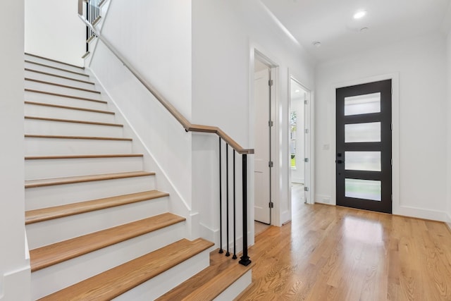 5216 Chestnut St, Bellaire, TX 77401 - foyer with stairs and wood finished floors