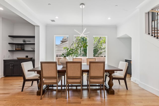 5216 Chestnut St, Bellaire, TX 77401 - dining area featuring light wood finished floors and recessed lighting