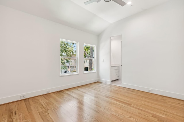 5216 Chestnut St, Bellaire, TX 77401 - spare room featuring a ceiling fan, light wood-style flooring, and lofted ceiling