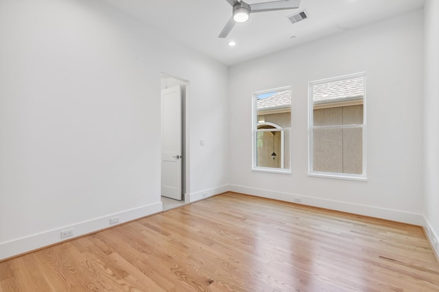 5216 Chestnut St, Bellaire, TX 77401 - empty room featuring wood finished floors, a ceiling fan, and recessed lighting