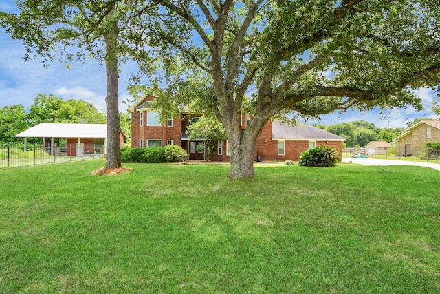 3515 Kansas St, Fresno, TX 77545 - view of front of home featuring a detached carport and brick siding
