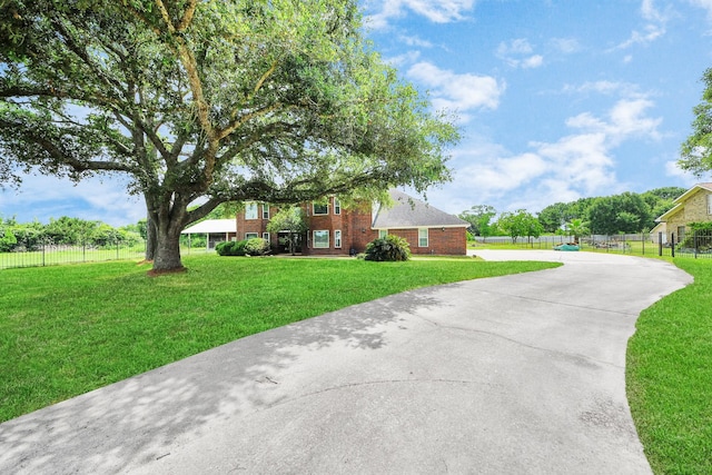 3515 Kansas St, Fresno, TX 77545 - view of front facade featuring brick siding and concrete driveway