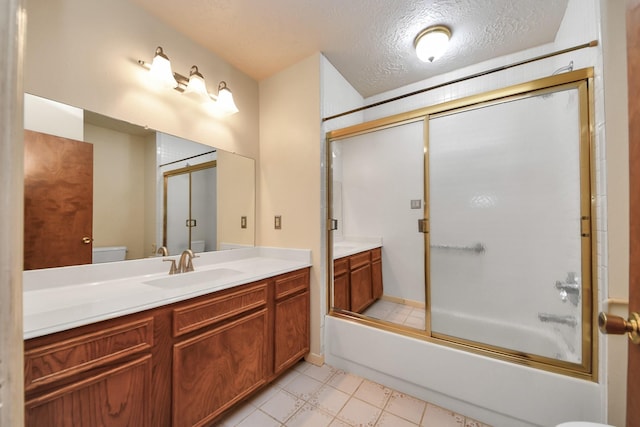 3515 Kansas St, Fresno, TX 77545 - full bath with vanity, bath / shower combo with glass door, and a textured ceiling