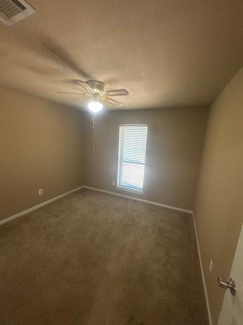 20114 Foxchester Ln, Humble, TX 77338 - spare room with carpet, a ceiling fan, and a textured ceiling