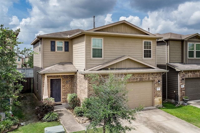 15903 Smithland Dr, Houston, TX 77084 - view of property with brick siding, a garage, concrete driveway, and a shingled roof