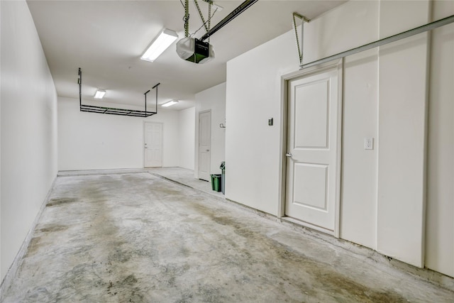 2904 Chenevert St Unit J, Houston, TX 77004 - garage featuring a garage door opener