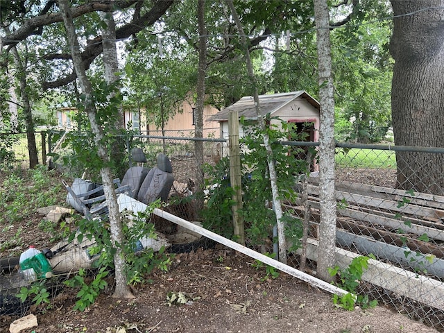 107 Russell St, Liberty Hill, TX 78642 - view of yard featuring a storage shed
