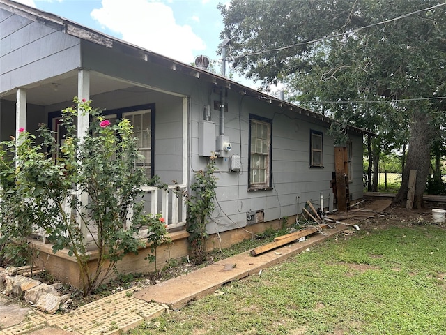 107 Russell St, Liberty Hill, TX 78642 - view of side of home featuring crawl space