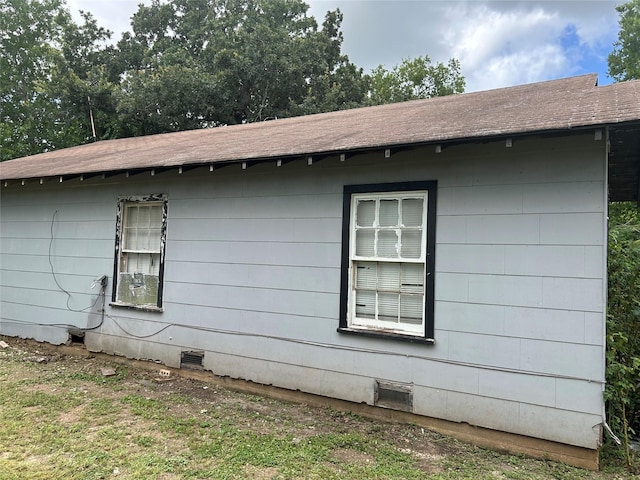 107 Russell St, Liberty Hill, TX 78642 - view of home's exterior with crawl space and roof with shingles