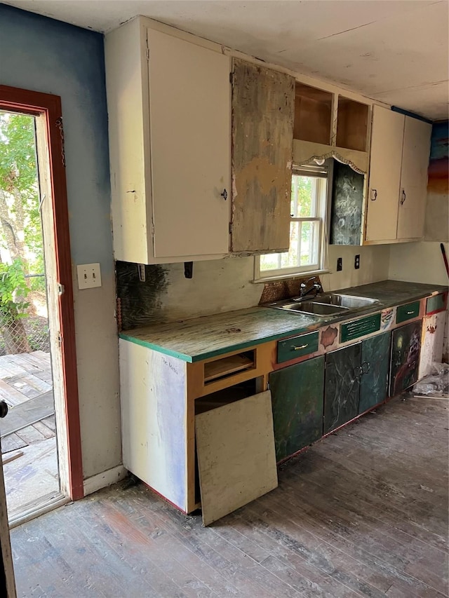 107 Russell St, Liberty Hill, TX 78642 - kitchen featuring a sink and light wood-style floors