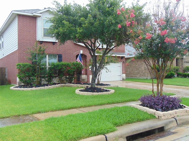 23727 Scotsman Dr, Katy, TX 77493 - view of front facade with brick siding, driveway, and a front yard