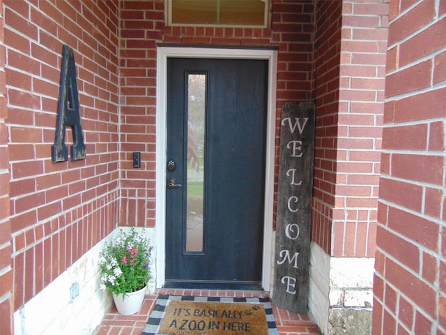 23727 Scotsman Dr, Katy, TX 77493 - doorway to property featuring brick siding