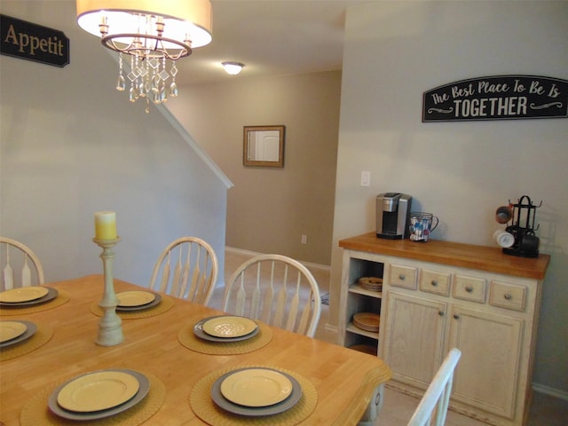 23727 Scotsman Dr, Katy, TX 77493 - dining space with a chandelier and stairway