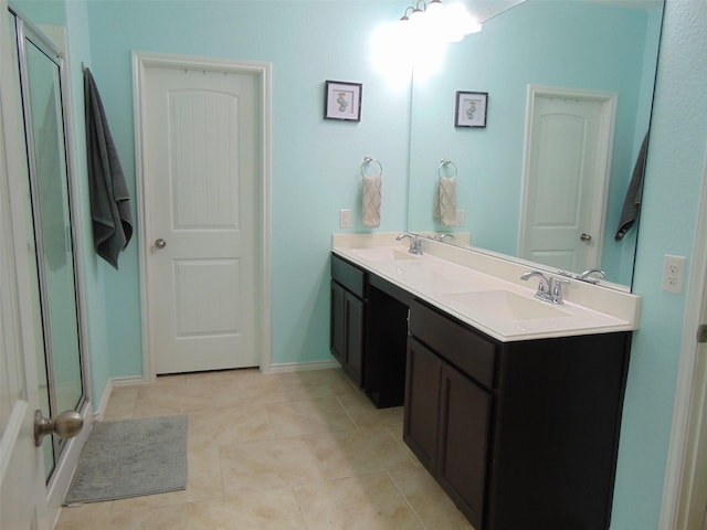 23727 Scotsman Dr, Katy, TX 77493 - bathroom featuring double vanity, a shower stall, and tile patterned floors