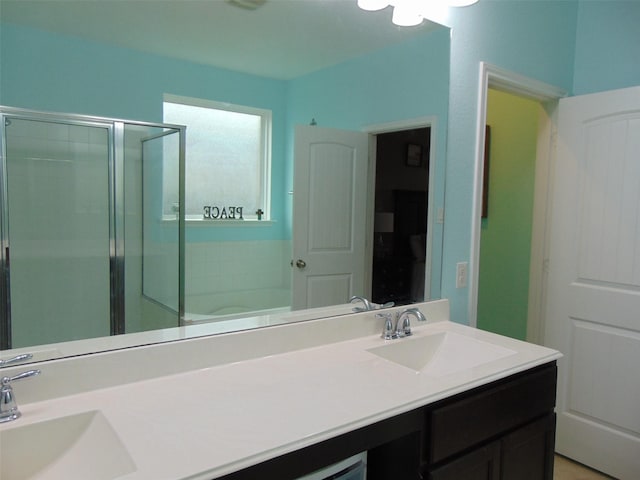 23727 Scotsman Dr, Katy, TX 77493 - full bath with double vanity, a shower stall, and a bath
