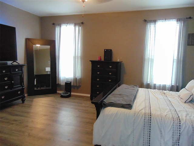 23727 Scotsman Dr, Katy, TX 77493 - bedroom with wood finished floors and baseboards