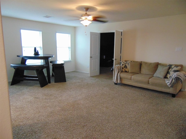 23727 Scotsman Dr, Katy, TX 77493 - living area featuring a ceiling fan and light colored carpet