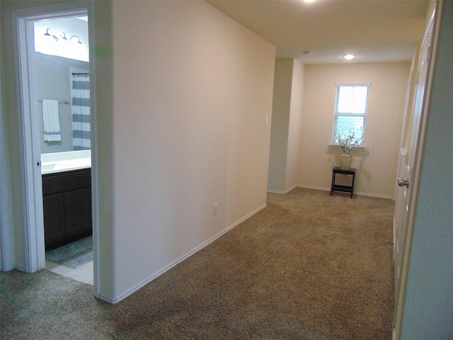 23727 Scotsman Dr, Katy, TX 77493 - hallway featuring light carpet