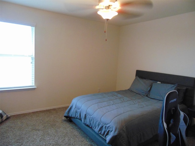 23727 Scotsman Dr, Katy, TX 77493 - carpeted bedroom with a ceiling fan and baseboards