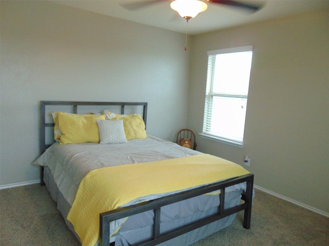23727 Scotsman Dr, Katy, TX 77493 - carpeted bedroom with baseboards and a ceiling fan