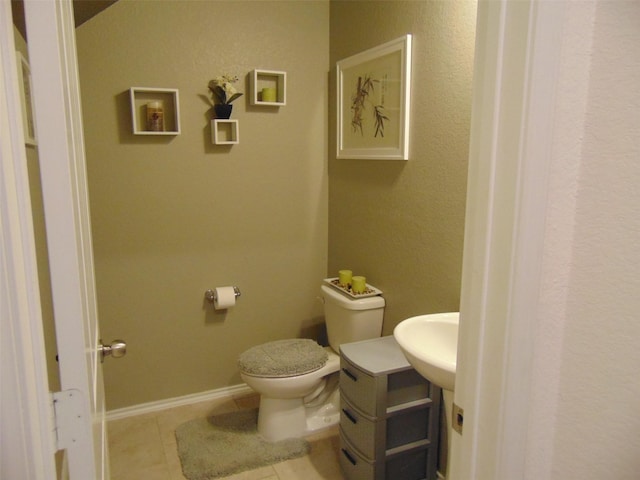 23727 Scotsman Dr, Katy, TX 77493 - bathroom featuring toilet and tile patterned flooring