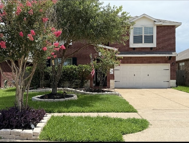 23727 Scotsman Dr, Katy, TX 77493 - view of front of property with brick siding, an attached garage, driveway, and a front lawn