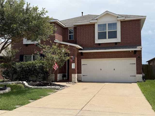 23727 Scotsman Dr, Katy, TX 77493 - traditional home featuring brick siding, an attached garage, driveway, and roof with shingles