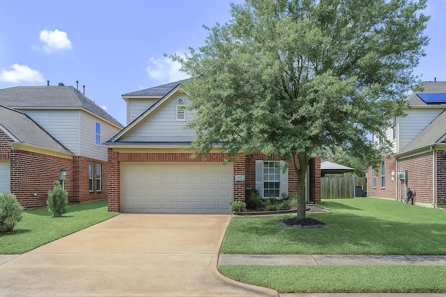 18527 Grove Brook Ln, Cypress, TX 77429 - view of front of property with concrete driveway, a garage, and brick siding