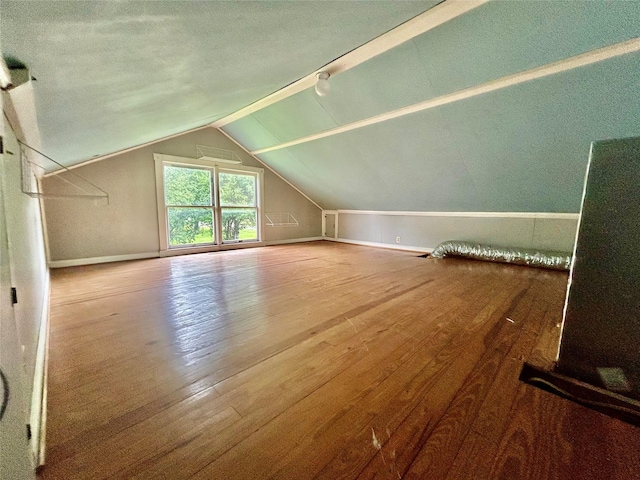 5119 33rd St, Groves, TX 77619 - bonus room featuring lofted ceiling and hardwood / wood-style floors