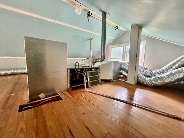 5119 33rd St, Groves, TX 77619 - living room with hardwood / wood-style floors and vaulted ceiling