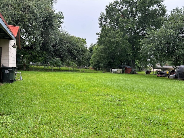 5119 33rd St, Groves, TX 77619 - view of grassy yard
