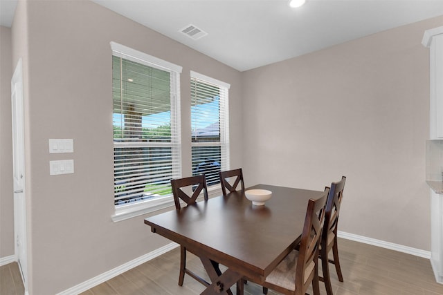 31319 Mallet Cv, Fulshear, TX 77441 - dining space with light wood finished floors and recessed lighting
