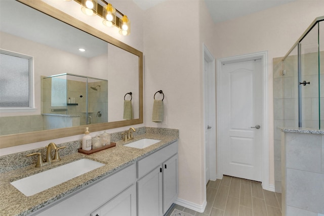 31319 Mallet Cv, Fulshear, TX 77441 - bathroom featuring a shower stall and double vanity