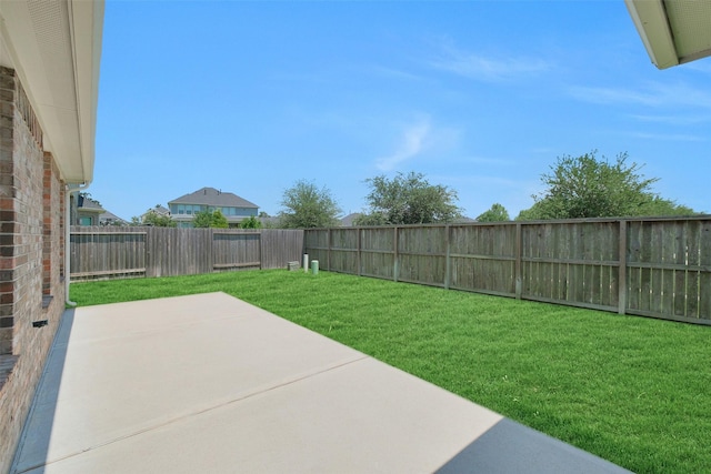 31319 Mallet Cv, Fulshear, TX 77441 - fenced backyard featuring a patio