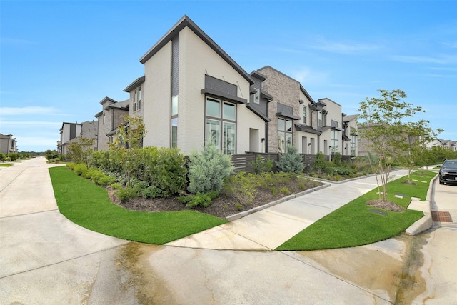 16634 Lake Austin St, Cypress, TX 77433 - view of building exterior featuring a residential view