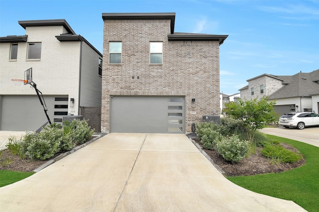 16634 Lake Austin St, Cypress, TX 77433 - view of front of home with brick siding, driveway, and an attached garage
