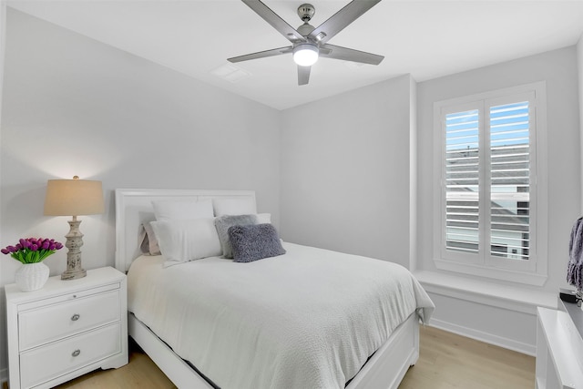 16634 Lake Austin St, Cypress, TX 77433 - bedroom with light wood-type flooring and ceiling fan