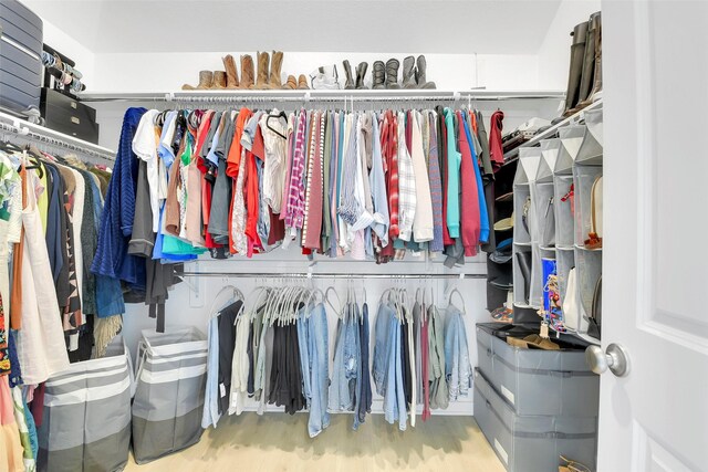 16634 Lake Austin St, Cypress, TX 77433 - walk in closet with wood finished floors