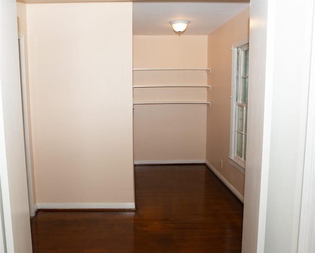 6718 E Bayou Dr, Hitchcock, TX 77563 - corridor with wood finished floors and baseboards