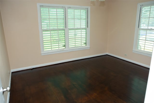 6718 E Bayou Dr, Hitchcock, TX 77563 - unfurnished room with wood finished floors and healthy amount of natural light